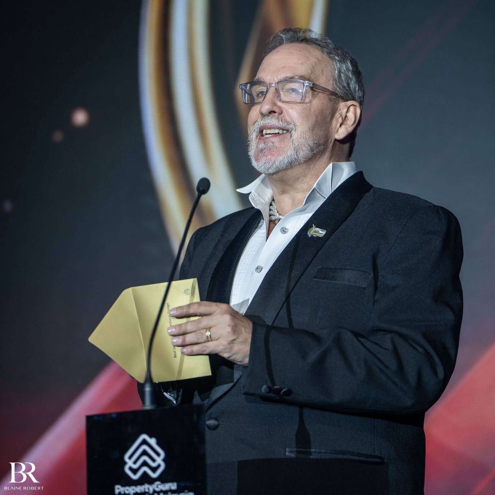 Blaine Robert on stage at the PropertyGuru Asia Property Awards Malaysia