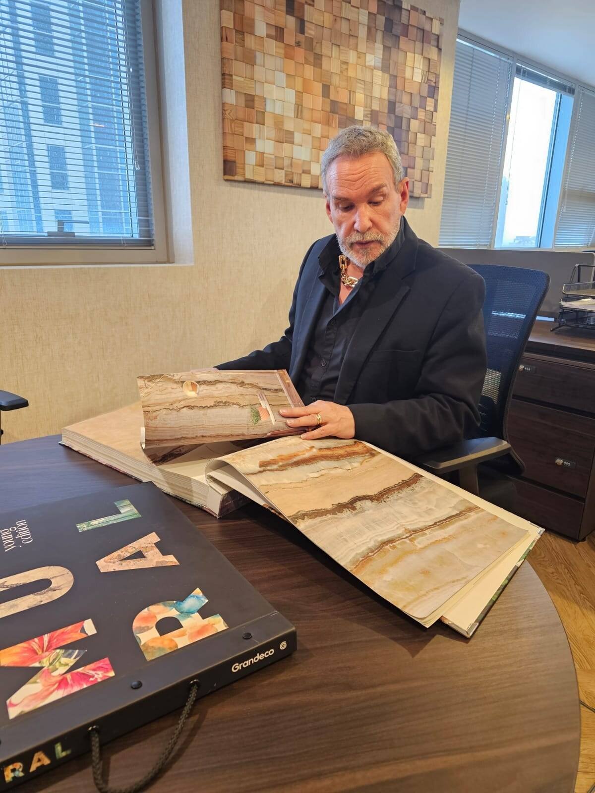 Blaine Robert reviewing material and finish selections