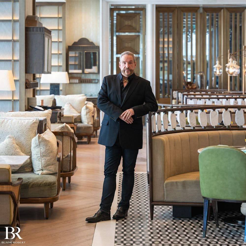 Blaine Robert in a hotel lounge interior, styled in black — Blaine Robert Design